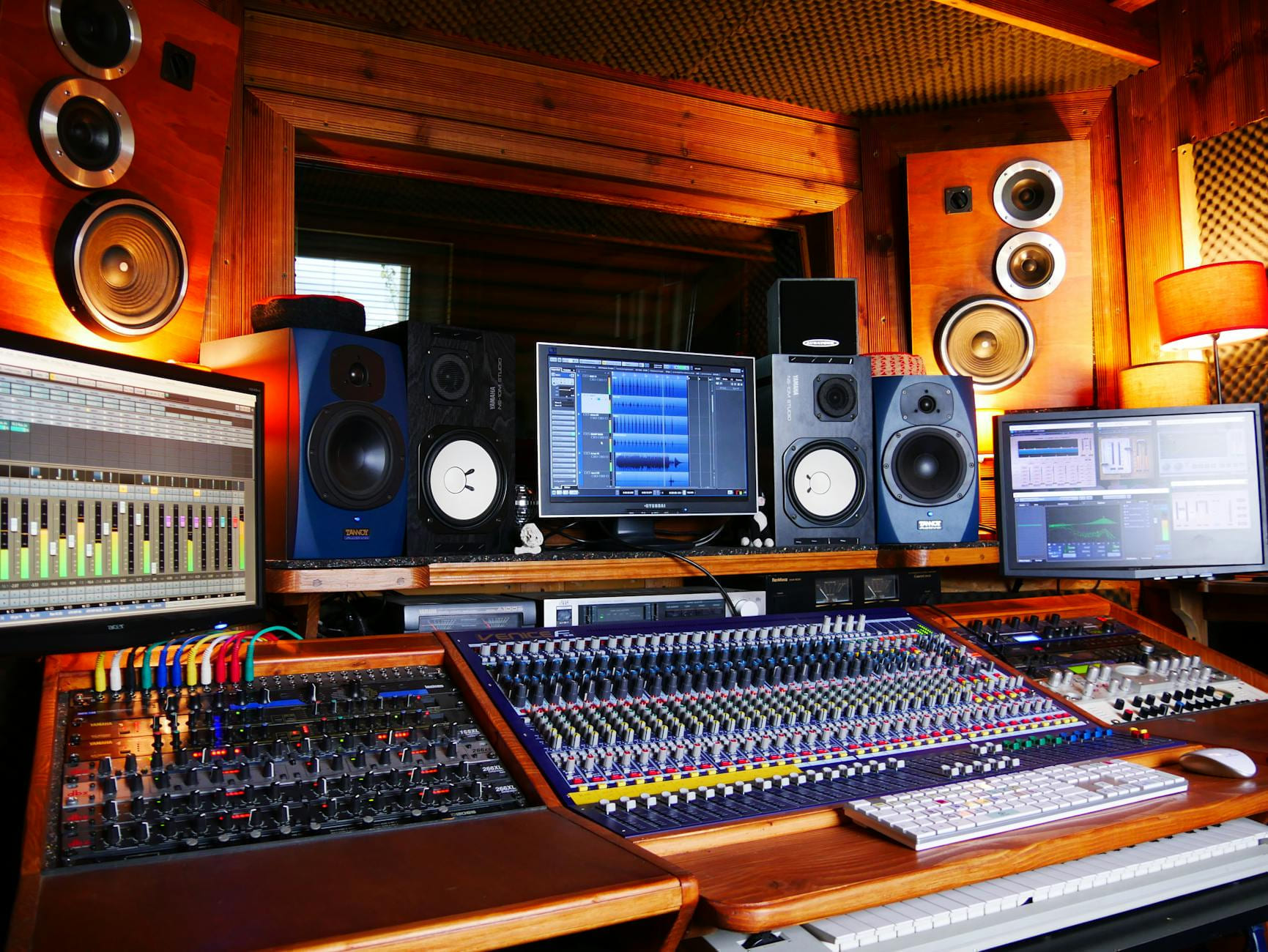 High-quality sound mixing desk and monitors in professional recording studio. on The Tech Shelf