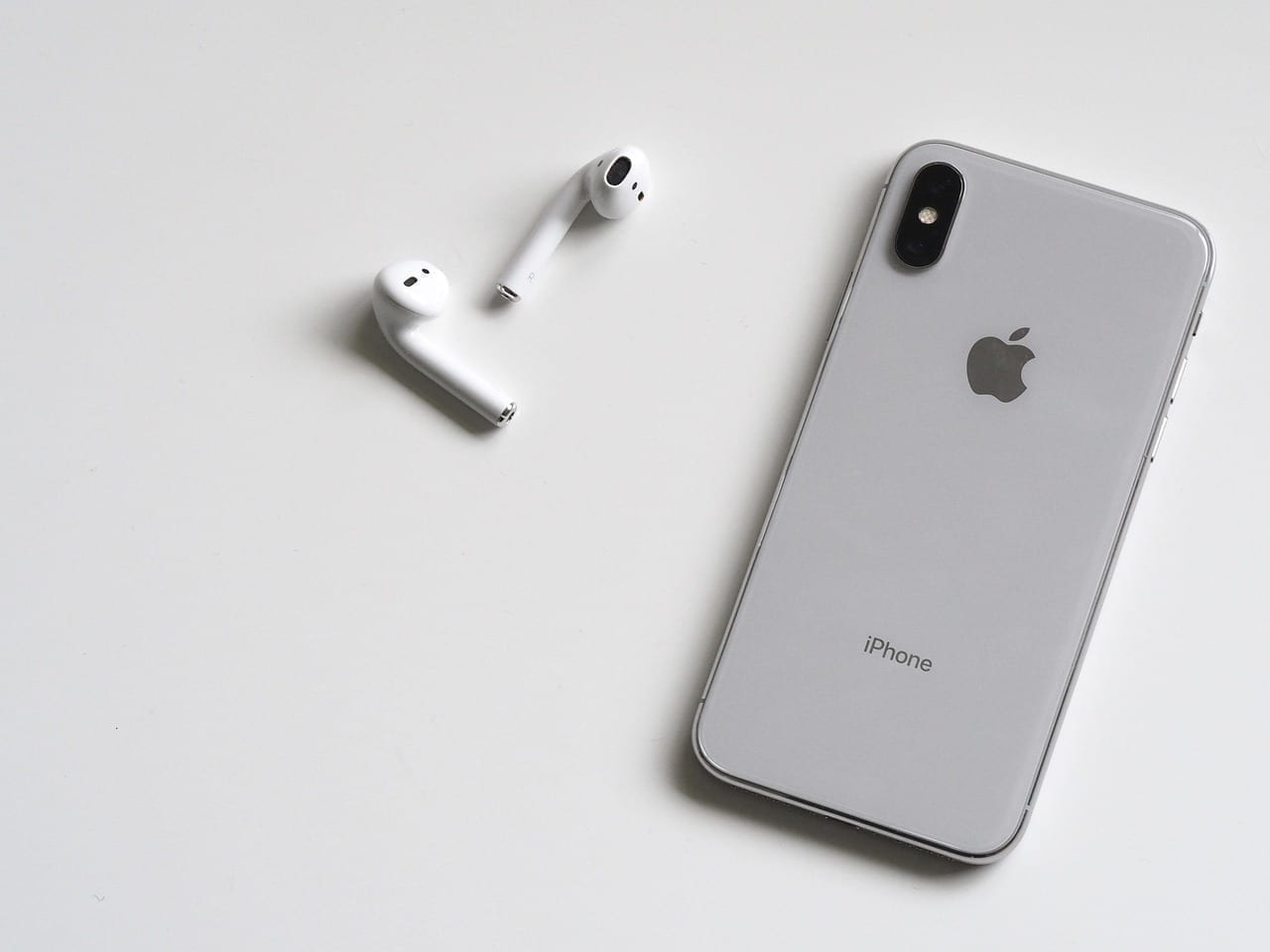 technology, iphone x, iphone, phone, smart phone, white, simple, minimal, mobile, smartphone, x, digital, screen, device, smart, communication, airpods, earphones, music, headphones, tech, business, electronic, information, design, desk, desktop, white background, clean, iphone x, iphone, smart phone, airpods, airpods, airpods, headphones, tech, tech, tech, tech, tech on The Tech Shelf